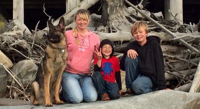 Crystal Locke with her dog and children